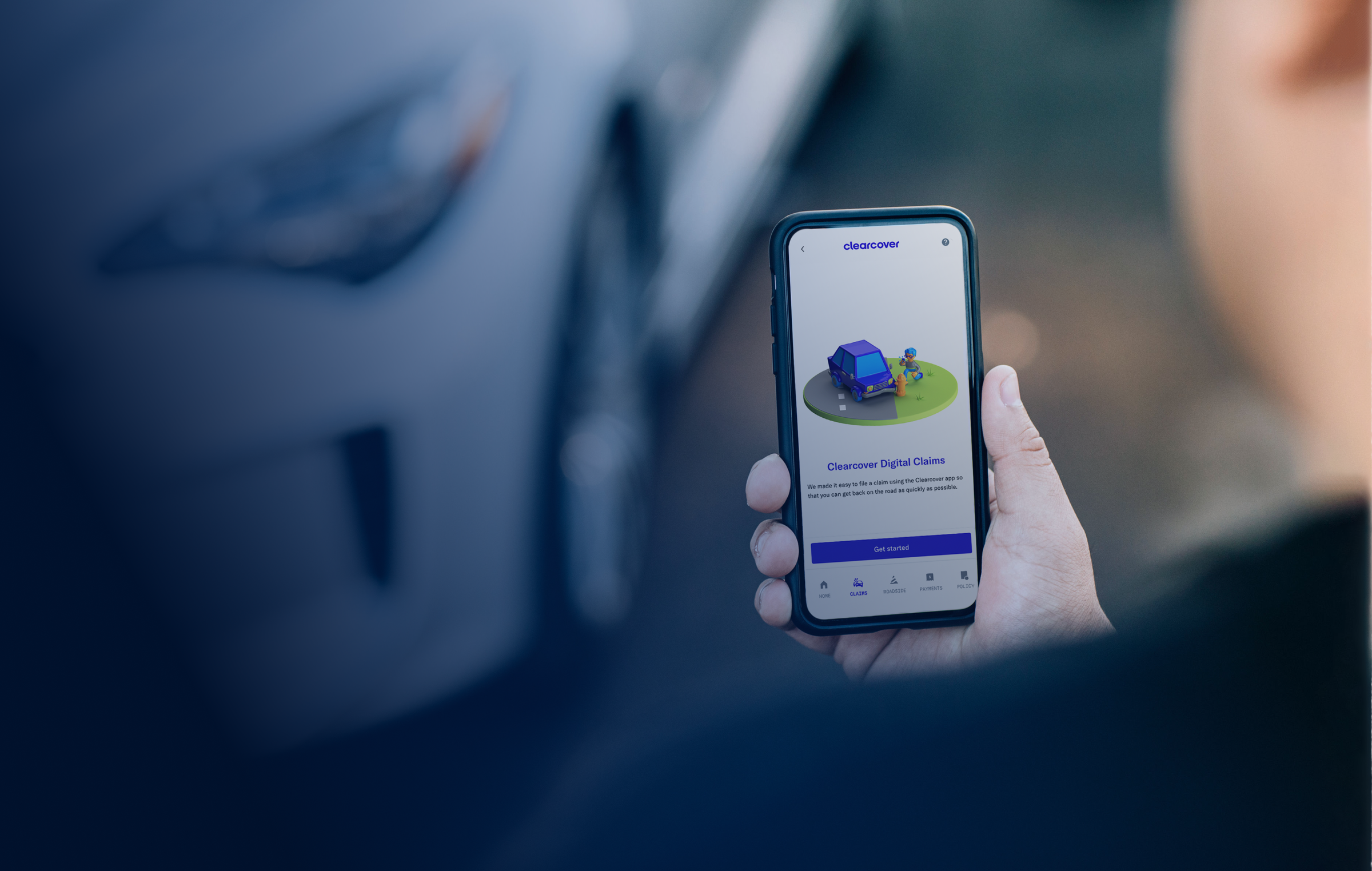Person holding a phone with Clearcover UI