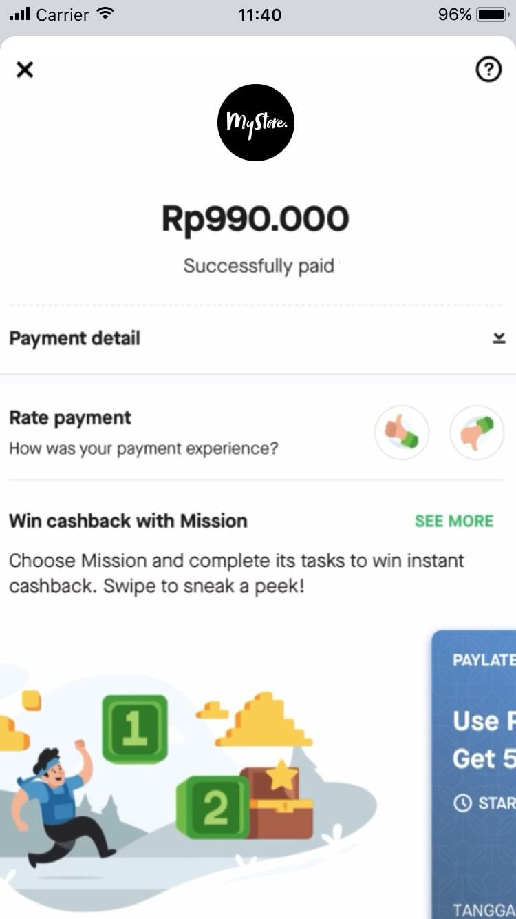 Mobile Bildschirm mit Bestätigung der erfolgreichen Zahlung und Cashback-Missionsangebot bei MyStore