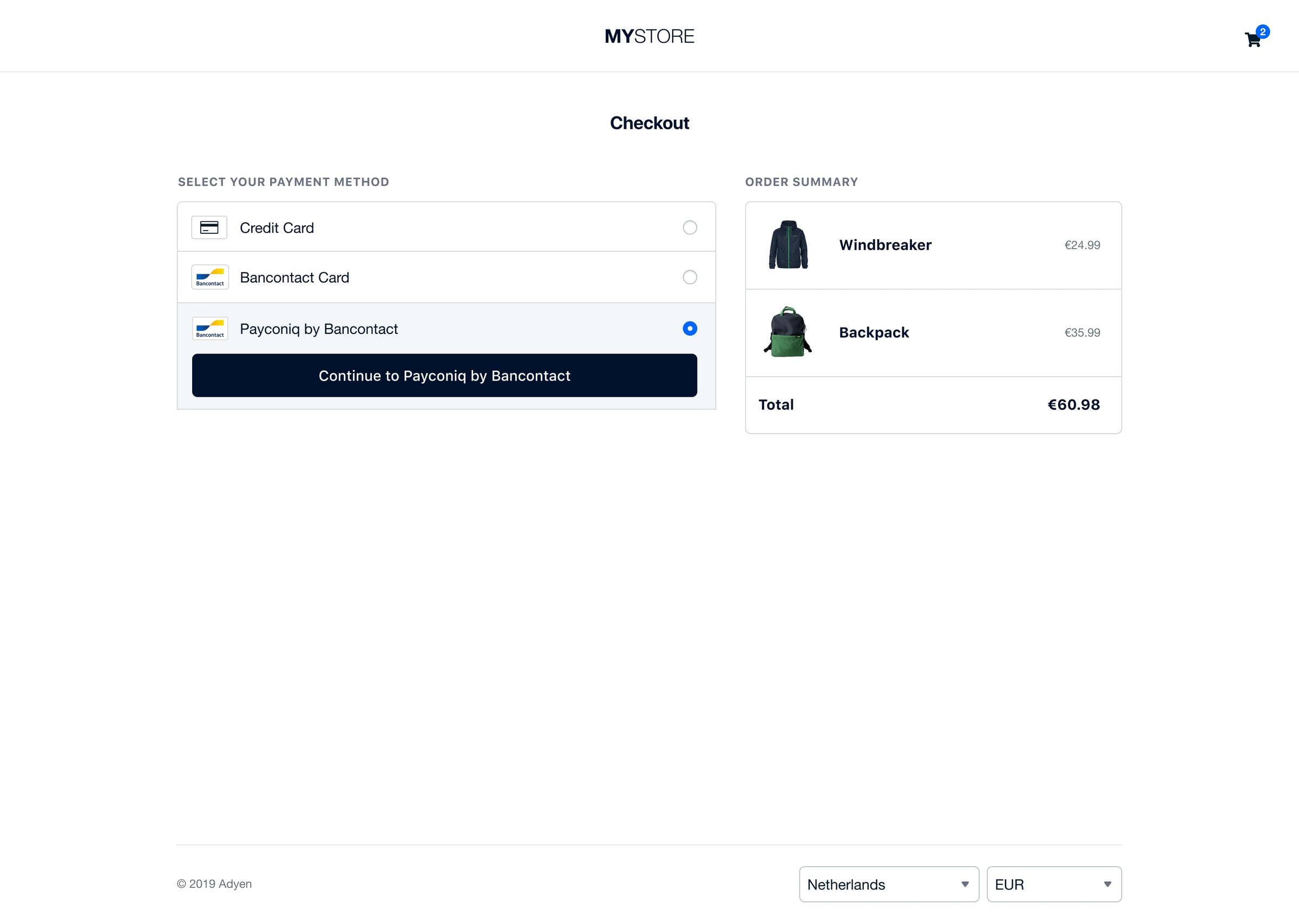 Pagina di pagamento Adyen con opzioni di pagamento e riepilogo ordine con windbreaker e zaino