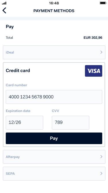 Schermo mobile che mostra i metodi di pagamento Adyen, tra cui iDeal, campi di input della carta di credito, Afterpay e SEPA.